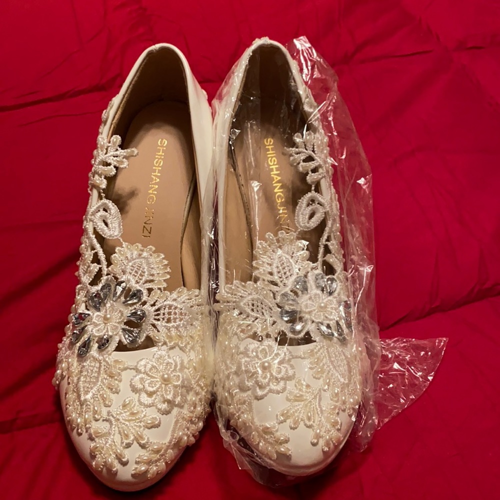 Beautiful cream colored wedding shoe